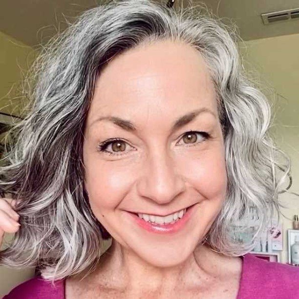 Medium Silver Hair With Swoopy Layers