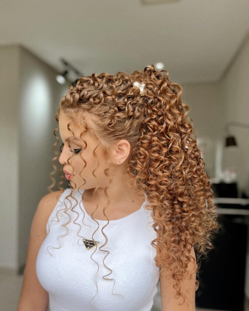 Curly Ginger Hair in a High Pony With Curly Tendrils
