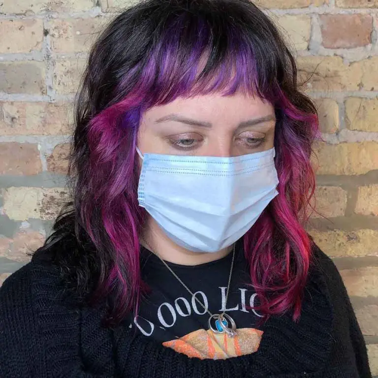 Medium Wolf Cut With Purple-Pink Highlights and Choppy Bangs