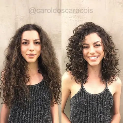 Medium Curly Deep Side Part Hairstyle