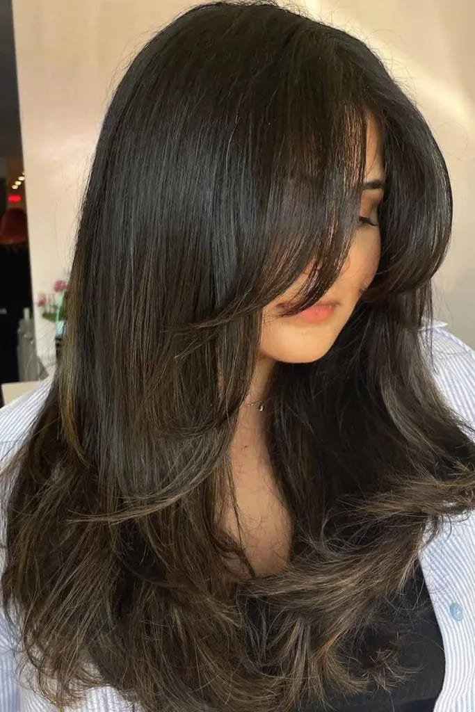  Chic Brunette Layers With Side-Swept Bangs
