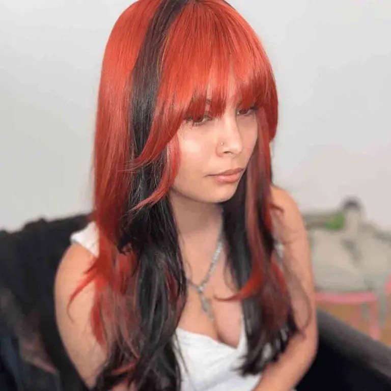 Wolf Cut on Red Hair With Blunt Bangs